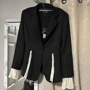 Classy blazer 
Very versatile you can persue a buisness or casual look with this